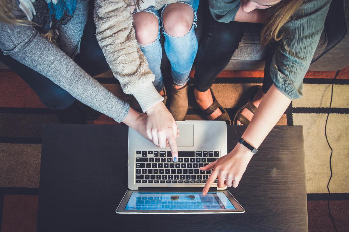 An image showing a person sending an email on a laptop, representing email marketing.