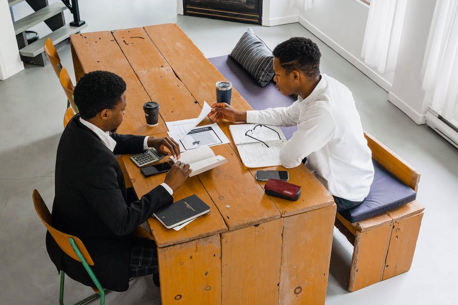 Image of a couple discussing finances, symbolizing open communication and managing joint finances together