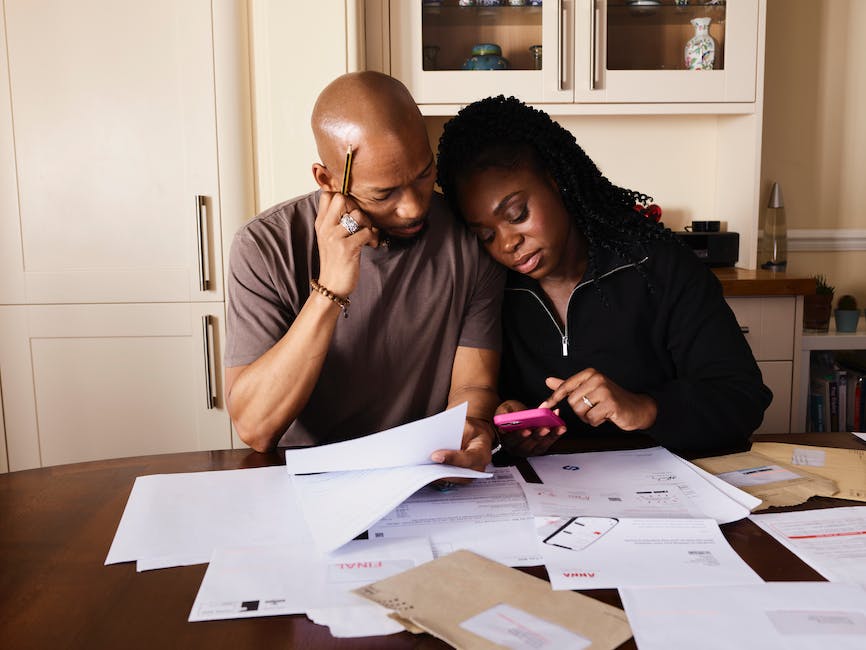 A person reviewing their monthly expenses and making financial decisions.