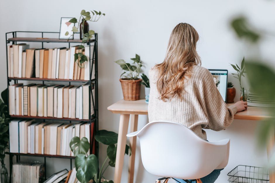 A focused remote worker in a home office setting, demonstrating increased productivity