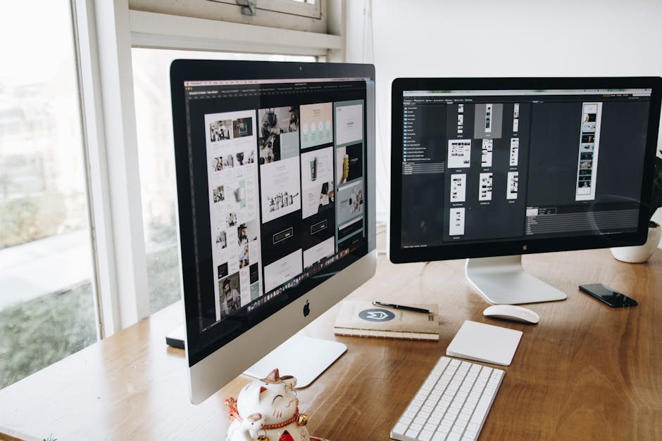 A modern home office setup with multiple screens, showing a software developer working remotely