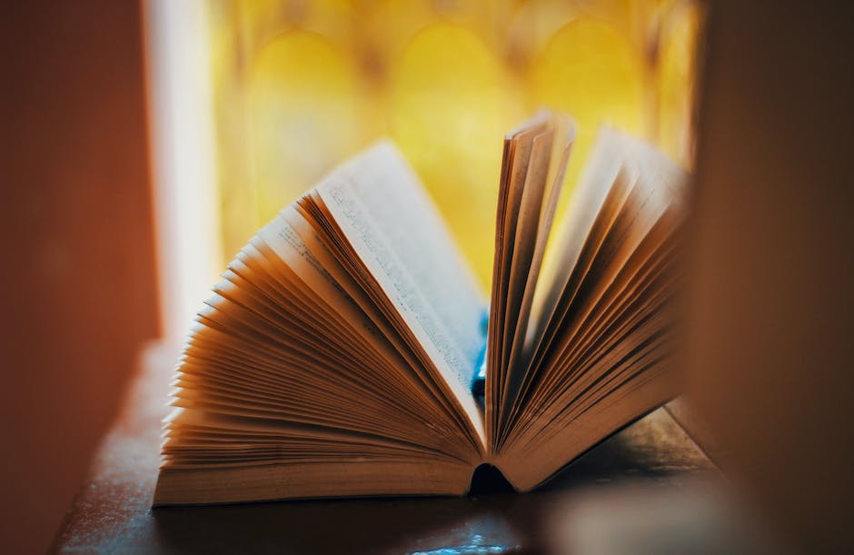 Image of a person reading a book, representing understanding the audience for an eBook